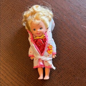 Vintage Barbie Blonde Kelly toddler in White Robe with Pink Trim and Red Outfit